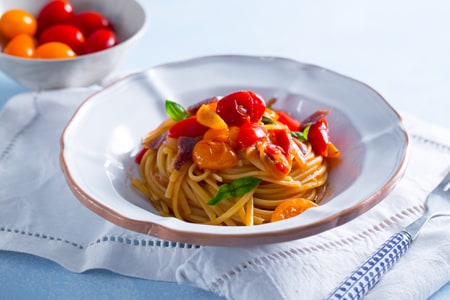 Pâtes aux tomates cerises, anchois et oignon